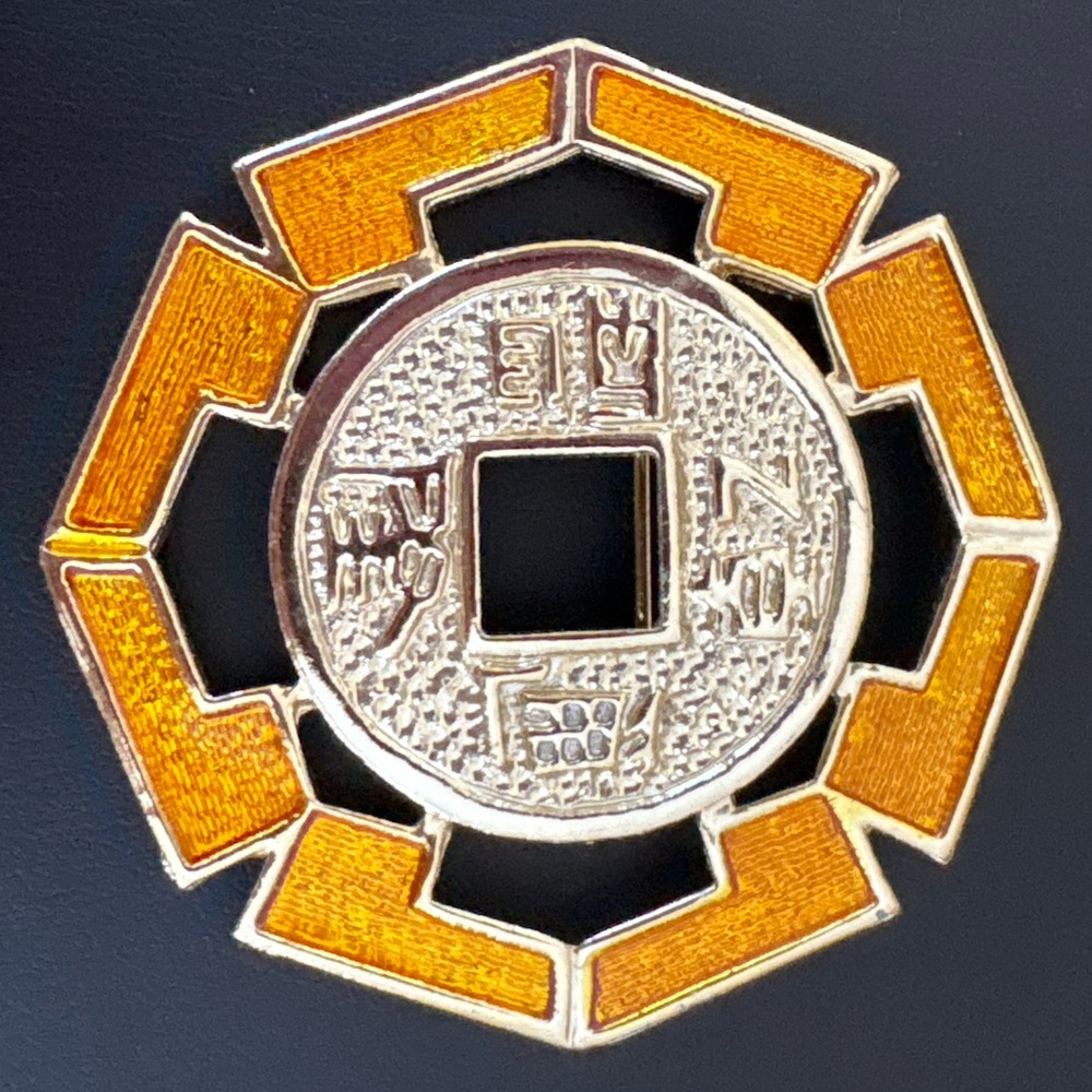 R.N.K. Vintage gold toned Chinese shield brooch RNK